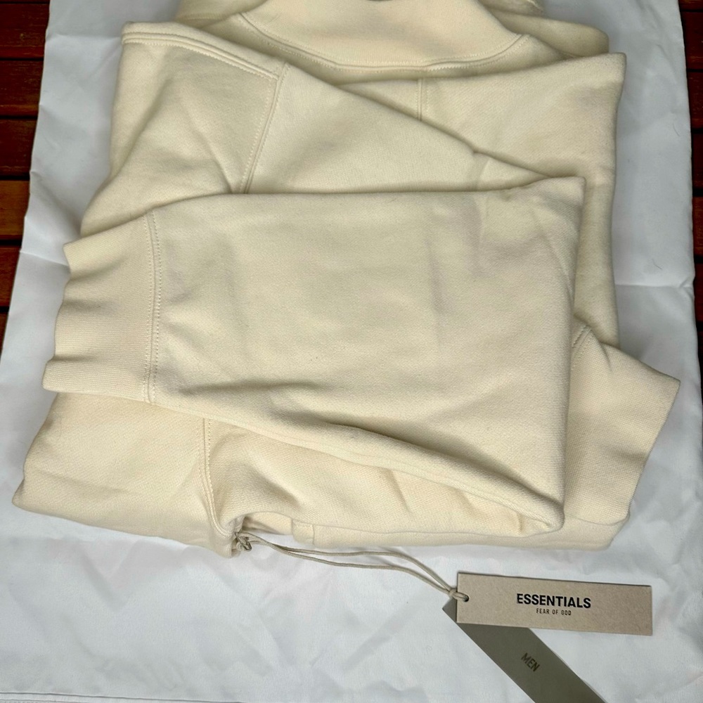 Brand new with tags, cream essentials, crewneck